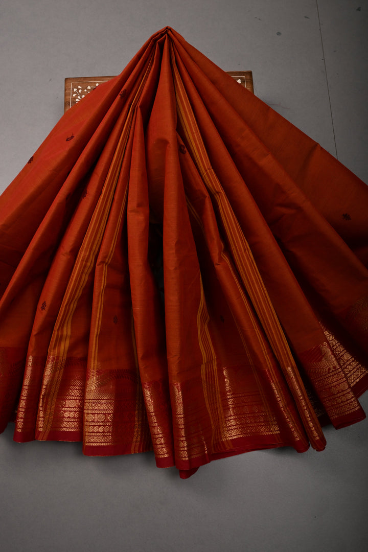 Rust Orange Kanchi Cotton Saree with Thread Buttas and Contrast Zari Borders | SHOBITAM
