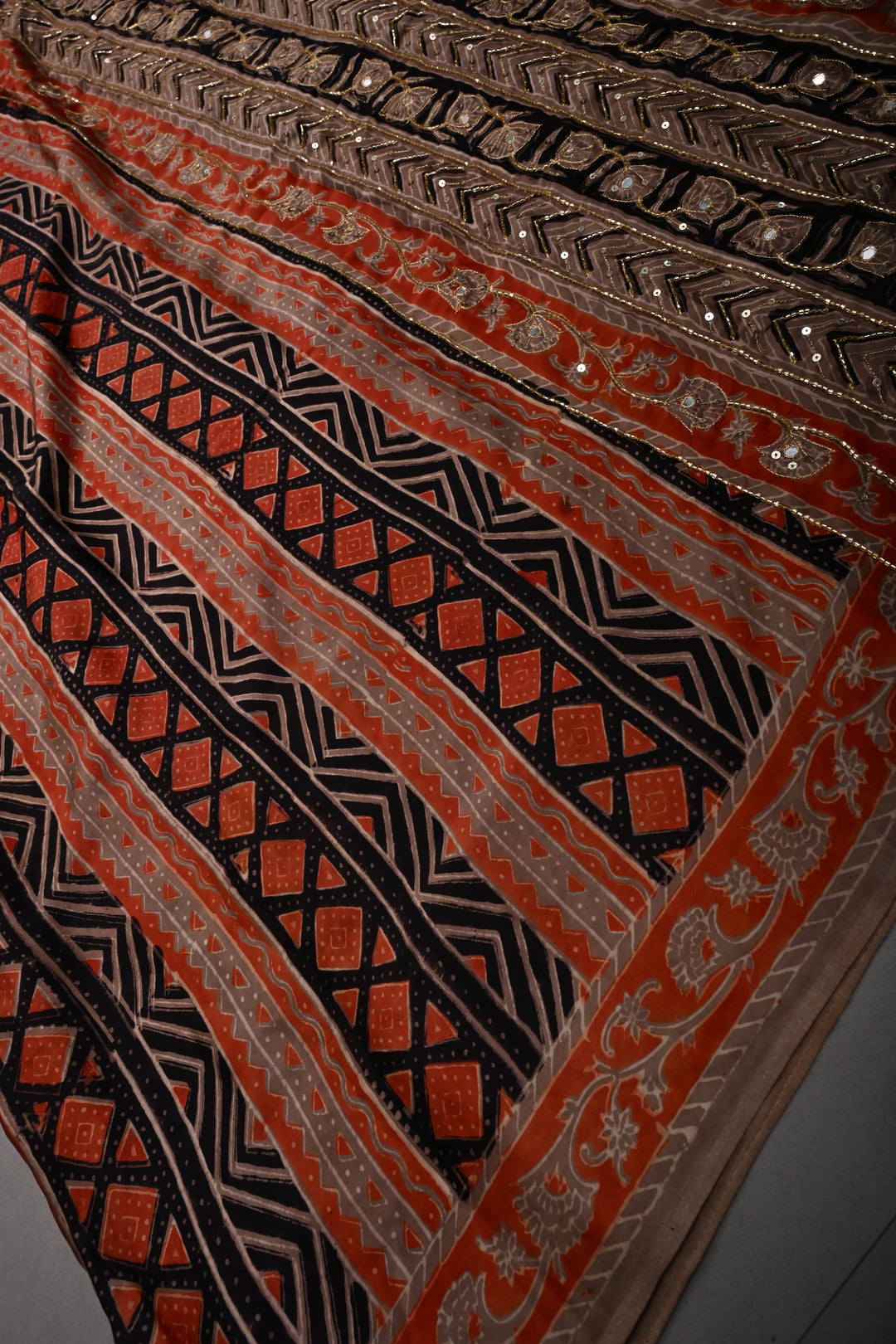 Black-Brown -Orange Ajrakh Hand Block Print on Modal Silk Saree with Sequins, Cutdana and Mirror Hand Embroidery