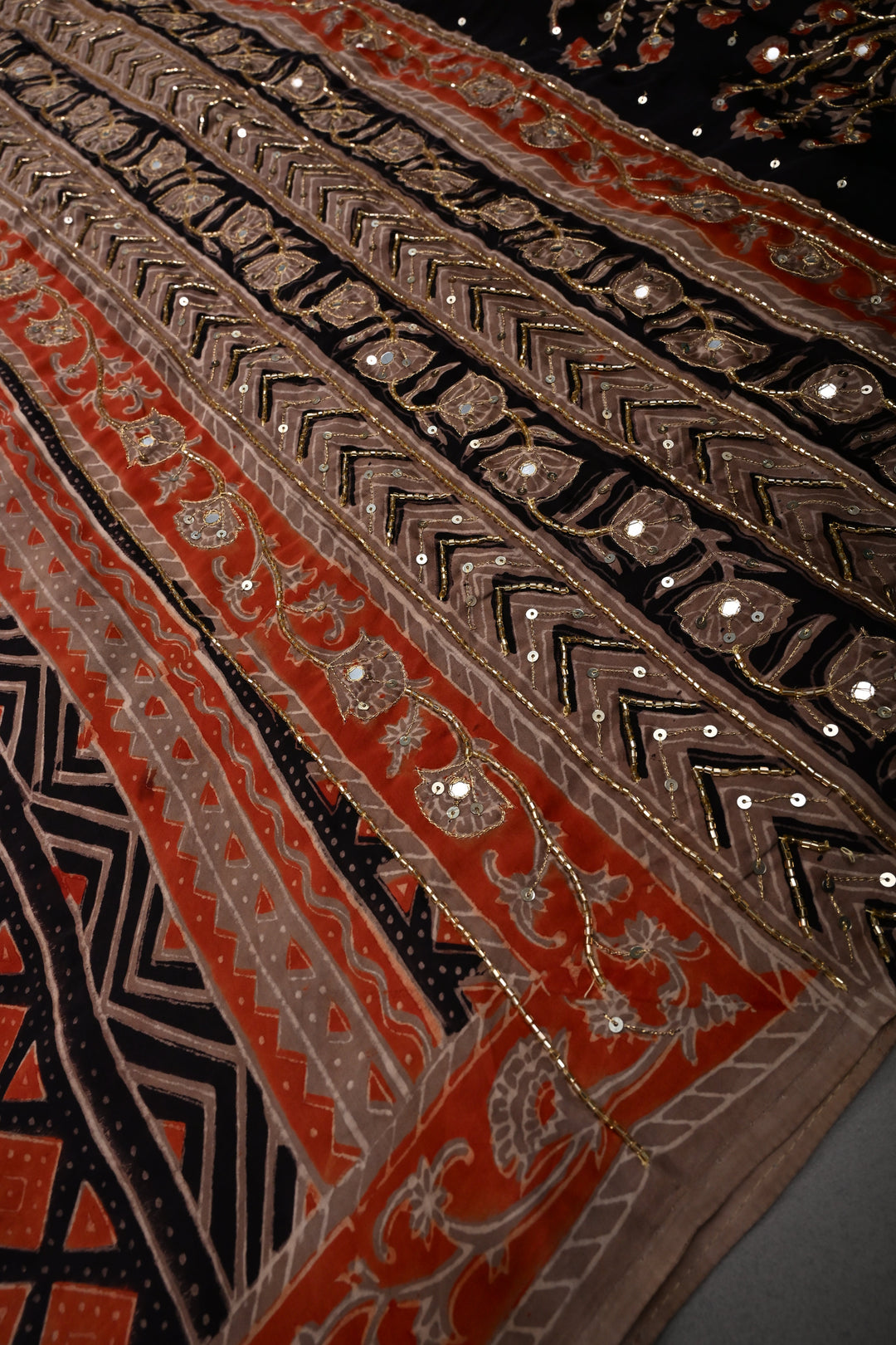 Black-Brown -Orange Ajrakh Hand Block Print on Modal Silk Saree with Sequins, Cutdana and Mirror Hand Embroidery