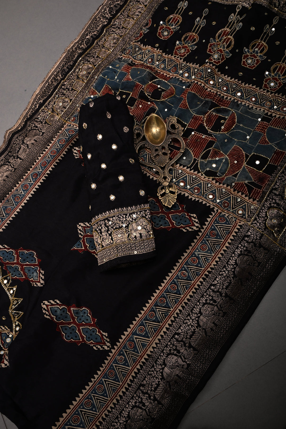 Black Sequins, Cutdana and Mirror Hand Embroidery on Ajrakh Hand Block Print on Dola Silk Saree with Fancy Zari Border | SHOBITAM