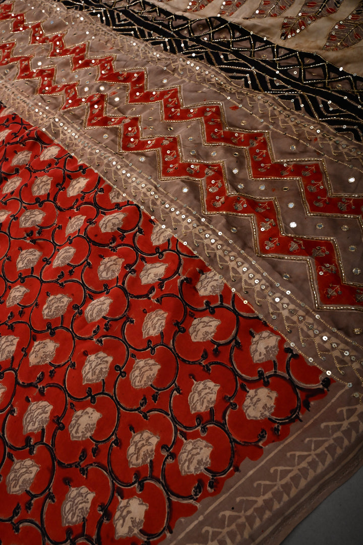 Rust Floral Hand Block Print on Modal Silk Saree with Sequins, Cutdana and Mirror Hand Embroidery | SHOBITAM