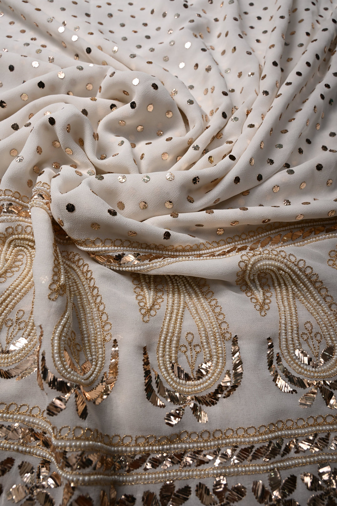 Exquisite Celebrity Mukeish and Moti Handwork Embellished on Pure Georgette Saree in White with Paisley Border | SHOBITAM