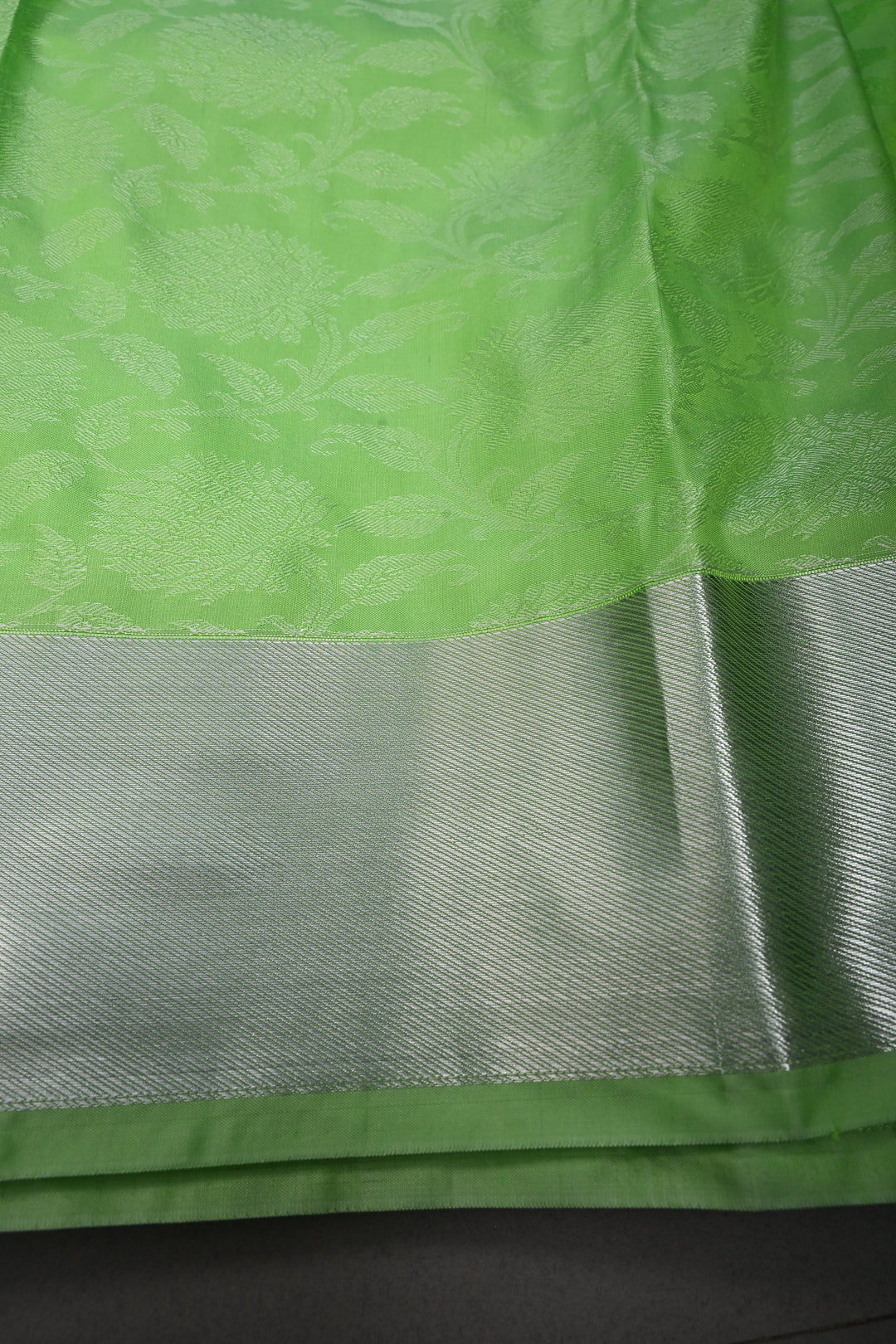 Neon Green Kanjivaram Soft Semi Silk Saree with Silver Floral Brocade Jaal and Zari Border | SHOBITAM