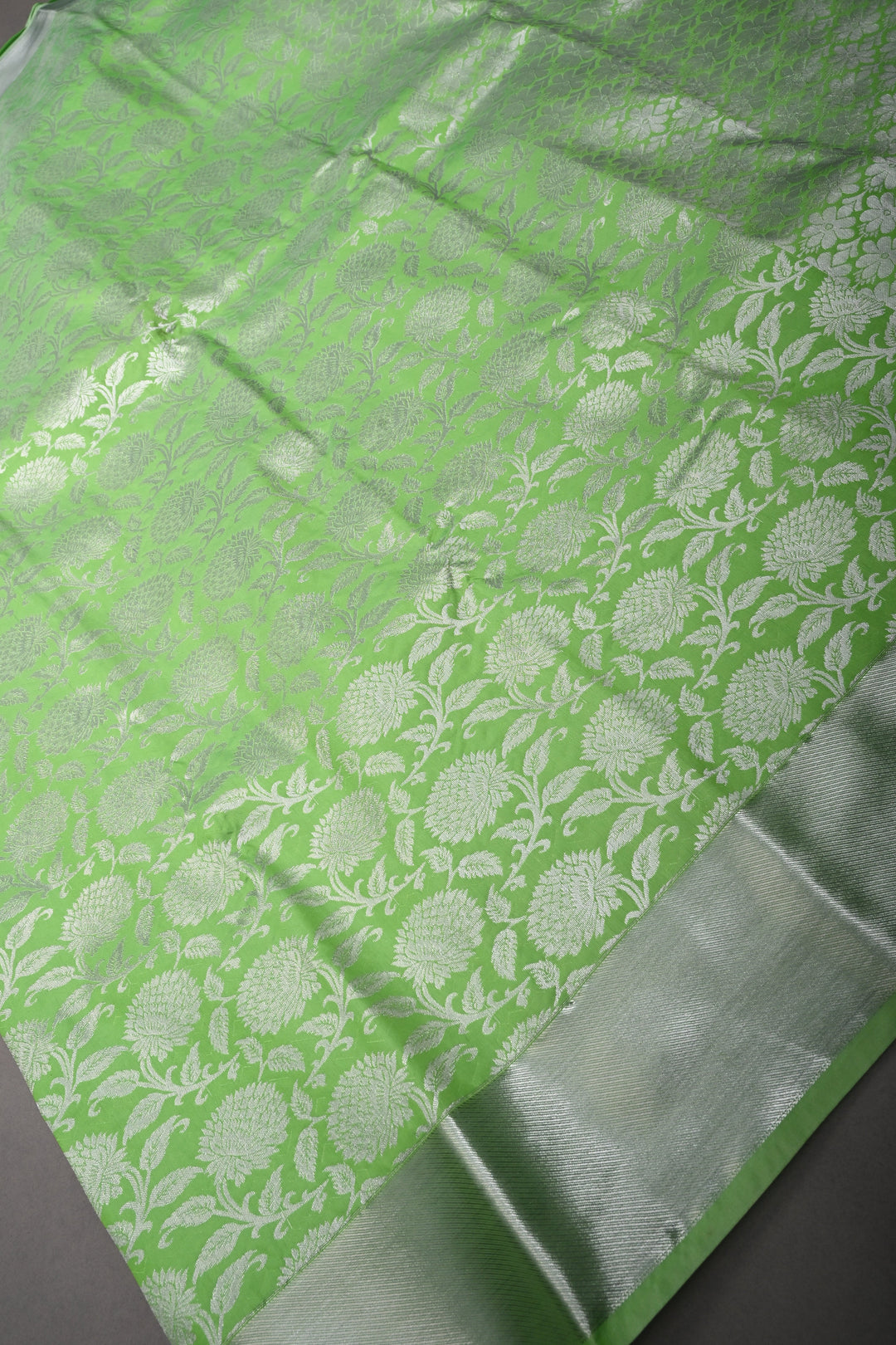 Neon Green Kanjivaram Soft Semi Silk Saree with Silver Floral Brocade Jaal and Zari Border | SHOBITAM