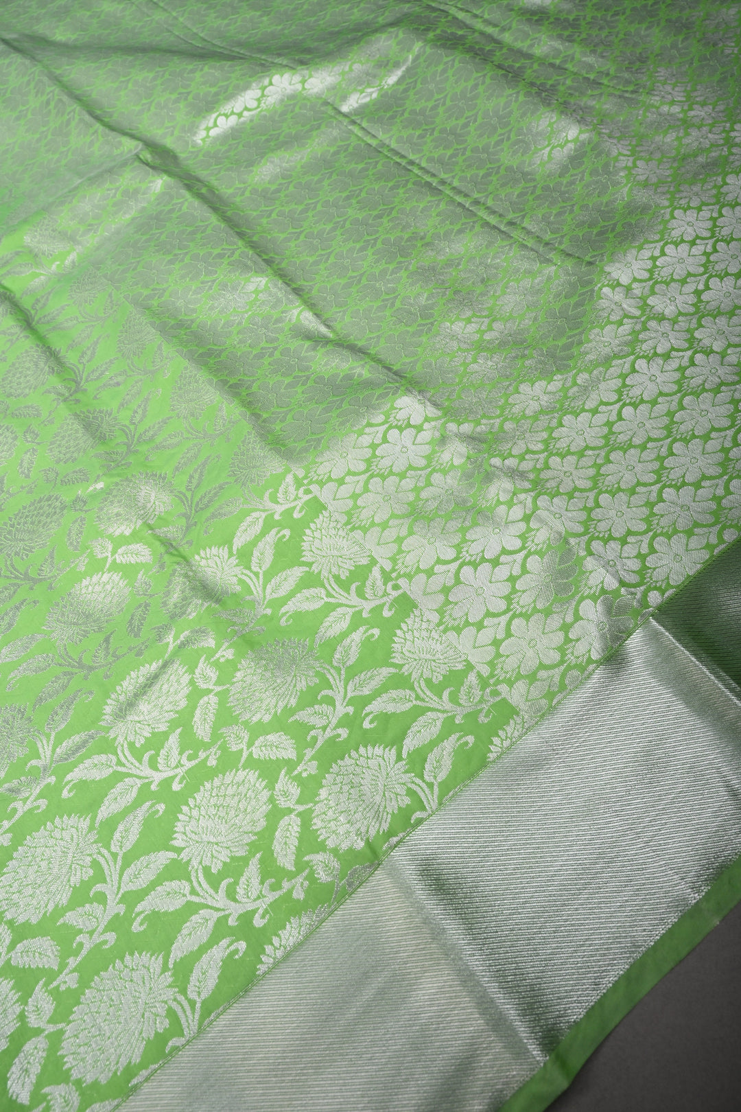 Neon Green Kanjivaram Soft Semi Silk Saree with Silver Floral Brocade Jaal and Zari Border | SHOBITAM