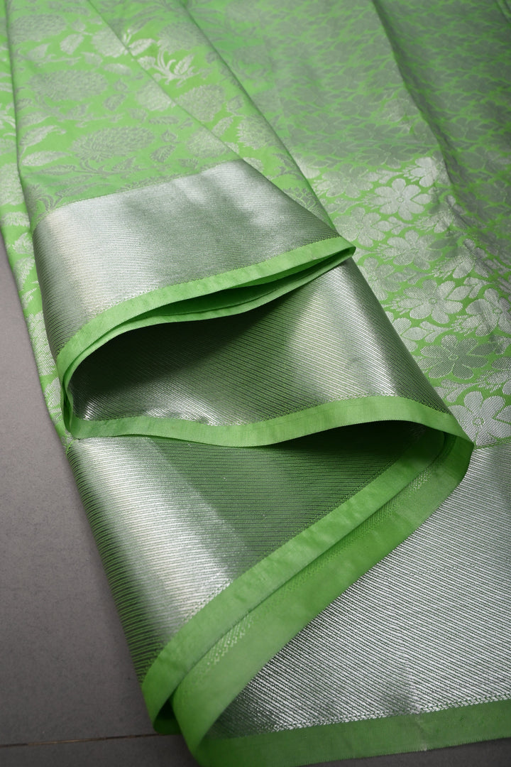 Neon Green Kanjivaram Soft Semi Silk Saree with Silver Floral Brocade Jaal and Zari Border | SHOBITAM