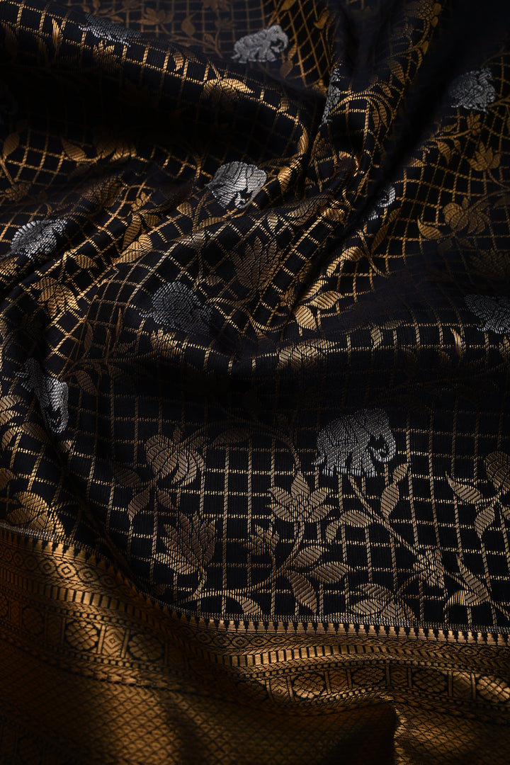 Blackish Blue Zari Checks on Kanjivaram Soft Semi Silk Saree with Floral Jaal-Silver Buttas and Zari Border | SHOBITAM