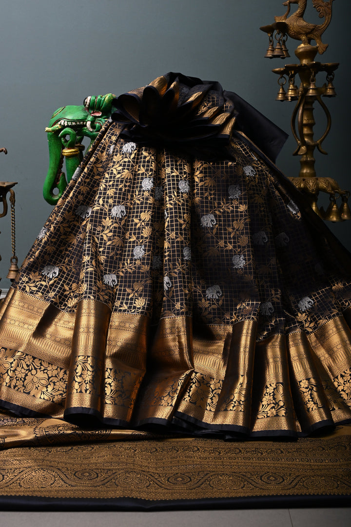 Blackish Blue Zari Checks on Kanjivaram Soft Semi Silk Saree with Floral Jaal-Silver Buttas and Zari Border | SHOBITAM