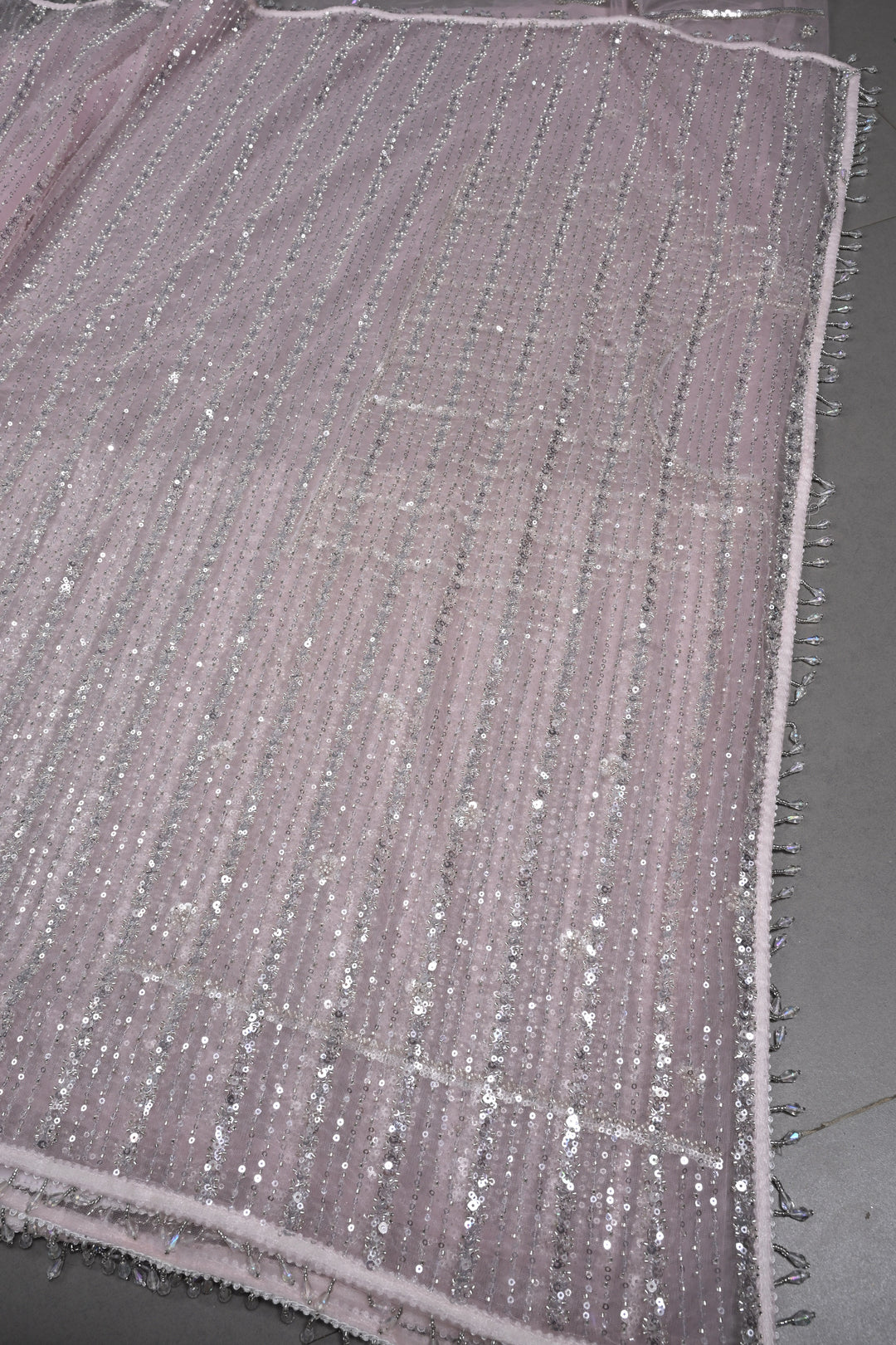 Baby Pink Stripes Design Sequins, Cutdana, Embellishment on Net Saree with Scallop Border | SHOBITAM