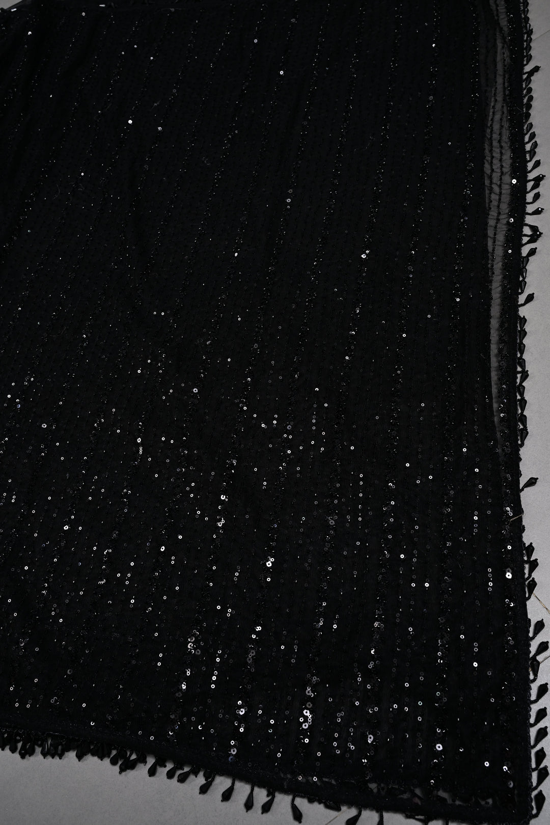 Black Net Saree with Vertical Stripes Embellishments and Dangling Beads Border | SHOBITAM