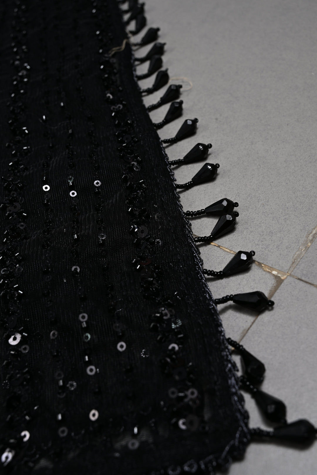 Black Net Saree with Vertical Stripes Embellishments and Dangling Beads Border | SHOBITAM