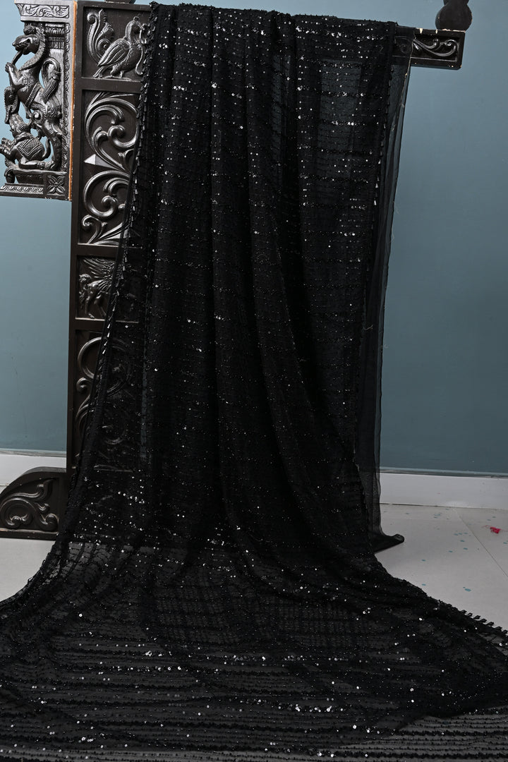 Black Net Saree with Vertical Stripes Embellishments and Dangling Beads Border | SHOBITAM