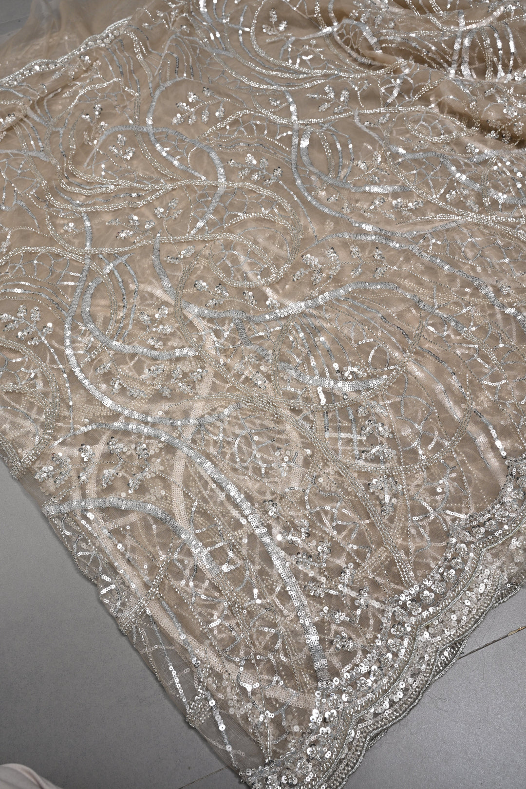 Champagne Swirling Sequins, Cutdana Embellishment on Net Saree with Scallop Border | SHOBITAM