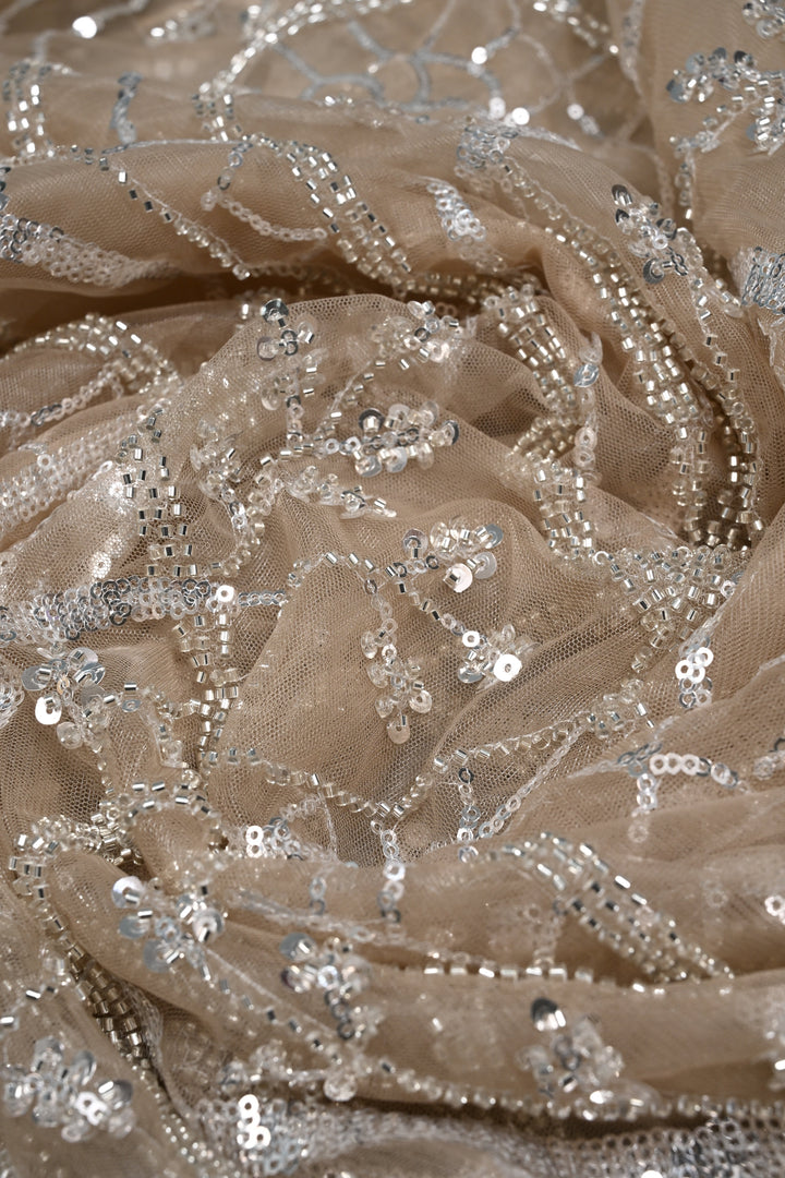 Champagne Swirling Sequins, Cutdana Embellishment on Net Saree with Scallop Border | SHOBITAM