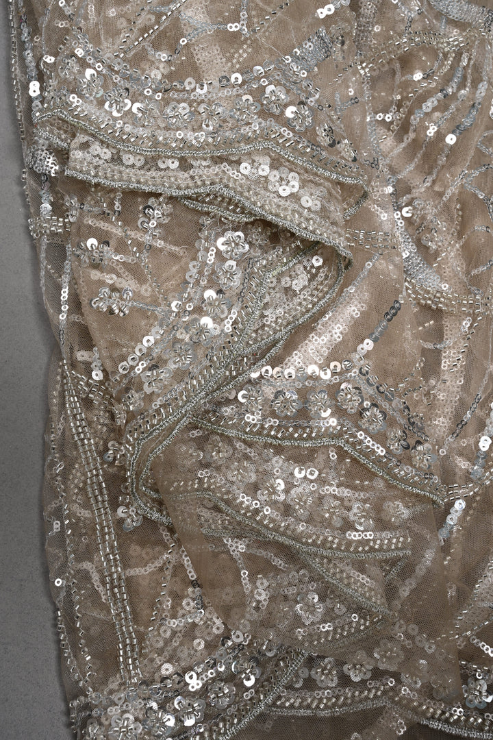 Champagne Swirling Sequins, Cutdana Embellishment on Net Saree with Scallop Border | SHOBITAM
