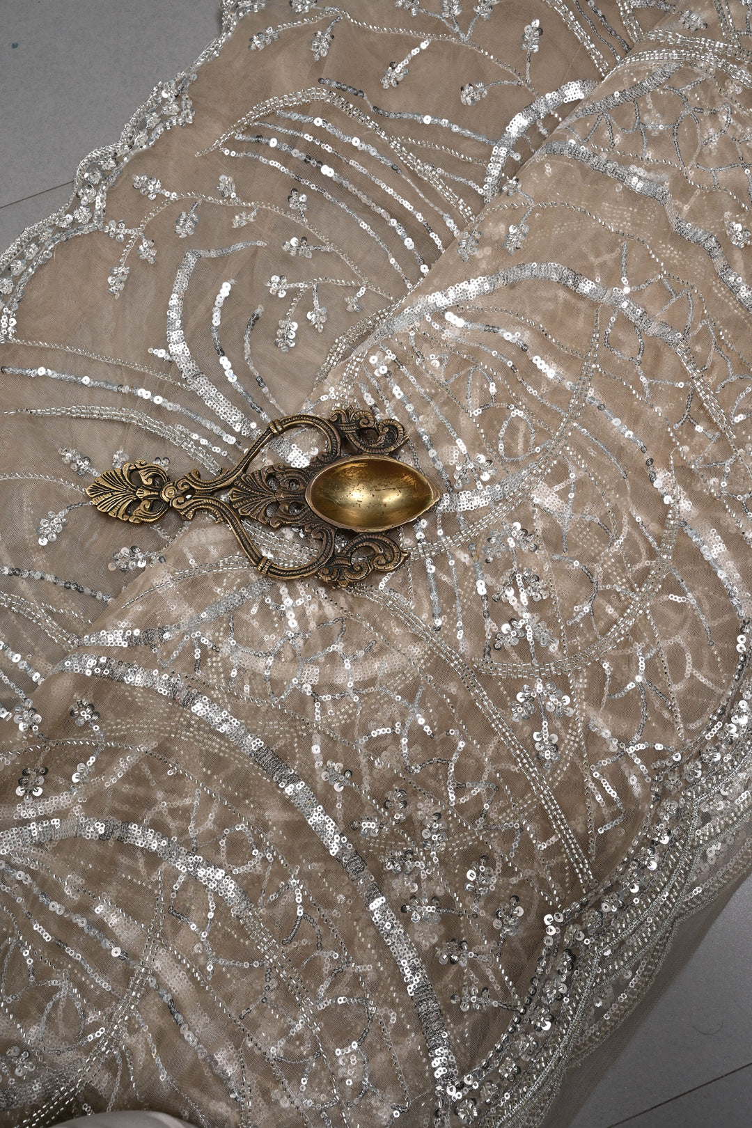 Champagne Swirling Sequins, Cutdana Embellishment on Net Saree with Scallop Border | SHOBITAM