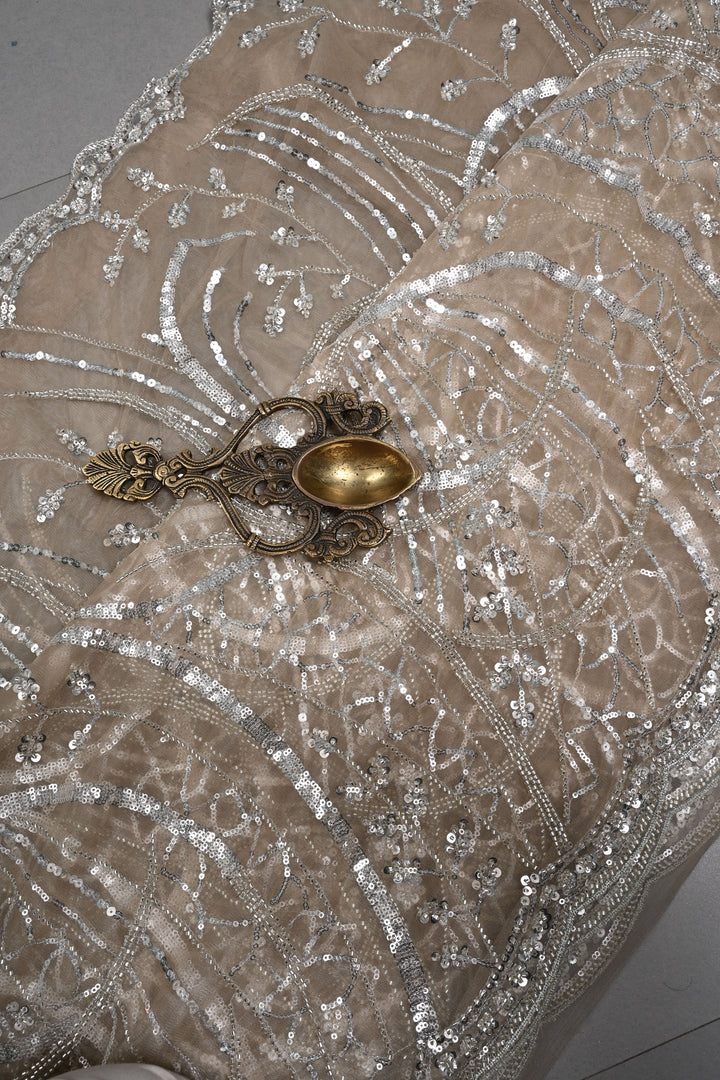 Champagne Swirling Sequins, Cutdana Embellishment on Net Saree with Scallop Border | SHOBITAM