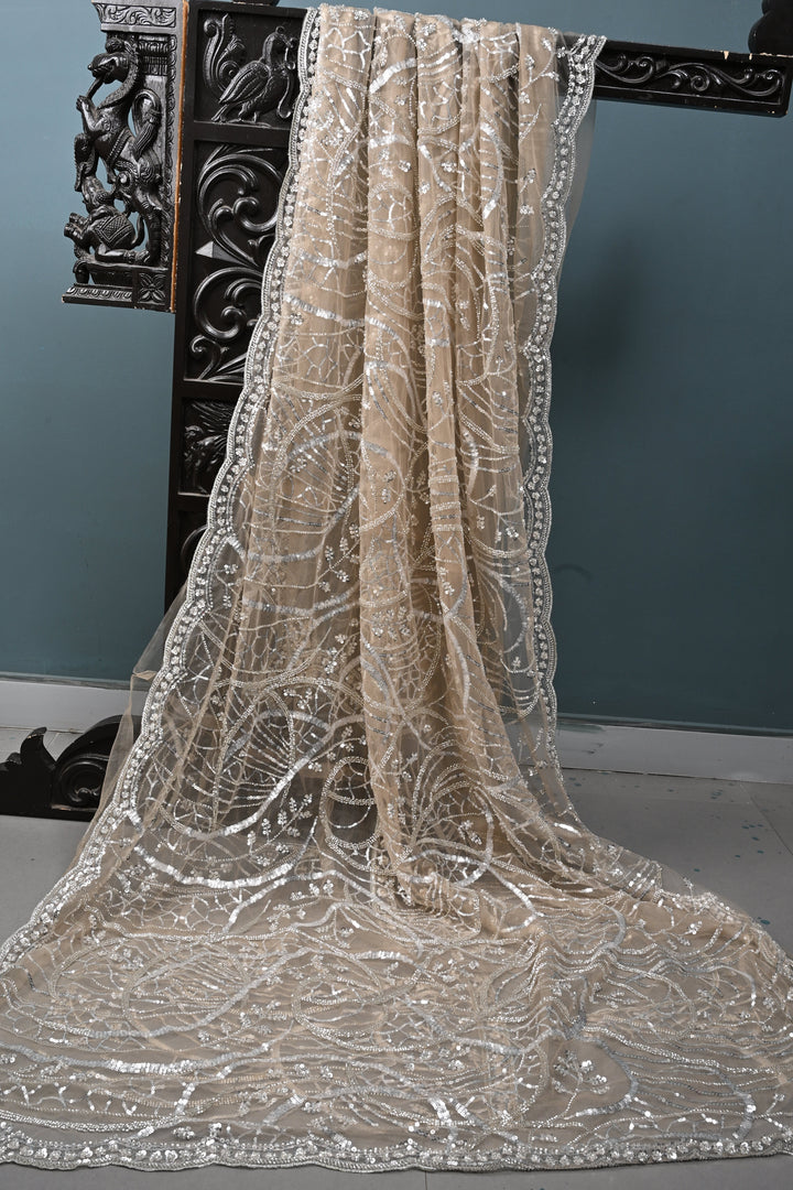 Champagne Swirling Sequins, Cutdana Embellishment on Net Saree with Scallop Border | SHOBITAM