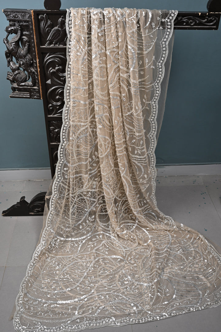 Champagne Swirling Sequins, Cutdana Embellishment on Net Saree with Scallop Border | SHOBITAM