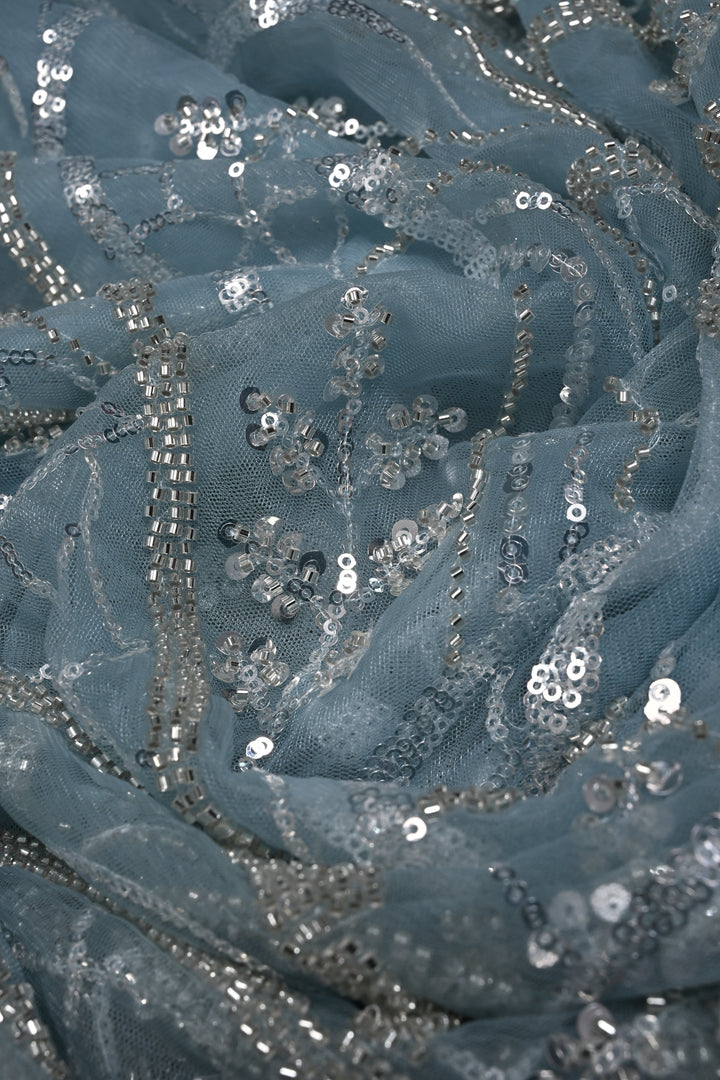 Powder Blue Swirling Design Sequins, Cutdana Embellishment on Net Saree with Scallop Border