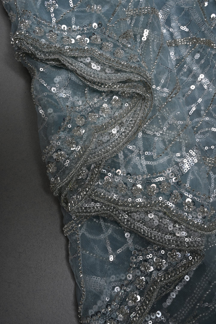 Powder Blue Swirling Design Sequins, Cutdana Embellishment on Net Saree with Scallop Border