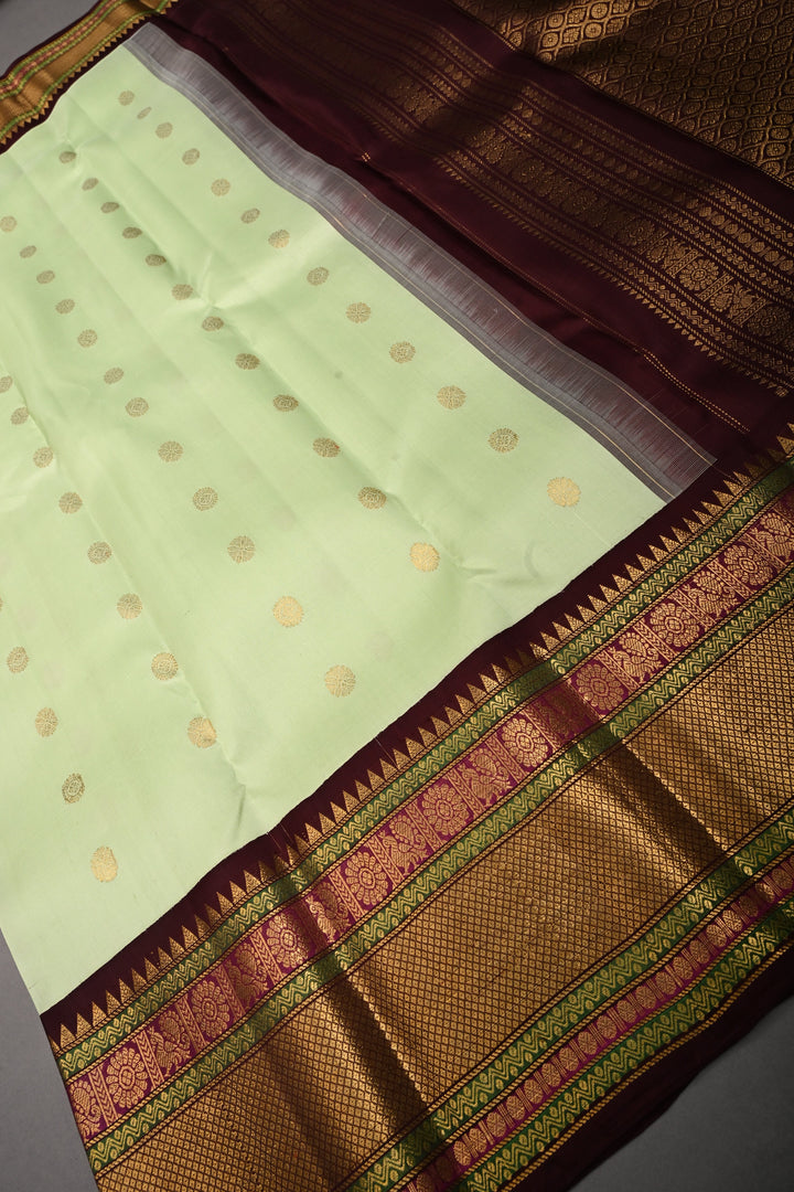 Pista Green Korvai Pure Gadwal Silk Saree with Zari Buttas and Contrast Zari Border | SILK MARK CERTIFIED | SHOBITAM