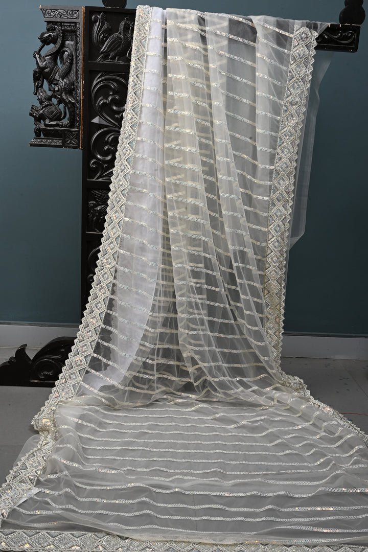 Ivory Sequins Stripes Design on Net Saree with Embroidered Scallop Border | SHOBITAM