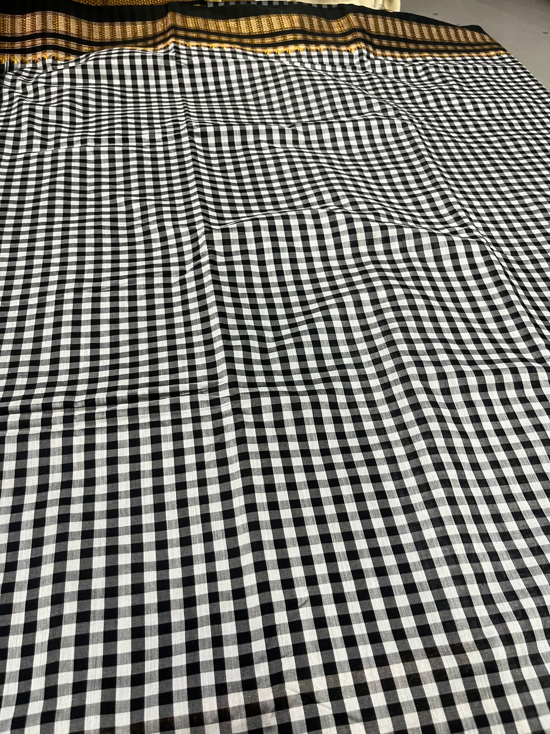 Black and white checks on mercerized cotton Bagalkote Iikal Saree with Zari Border | SHOBITAM