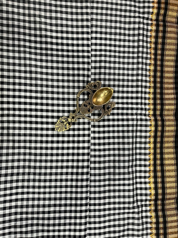 Black and white checks on mercerized cotton Bagalkote Iikal Saree with Zari Border | SHOBITAM