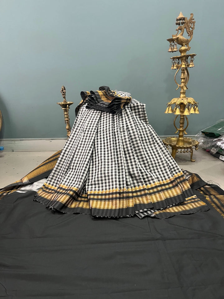 Black and white checks on mercerized cotton Bagalkote Iikal Saree with Zari Border | SHOBITAM