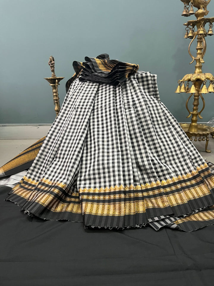 Black and white checks on mercerized cotton Bagalkote Iikal Saree with Zari Border | SHOBITAM