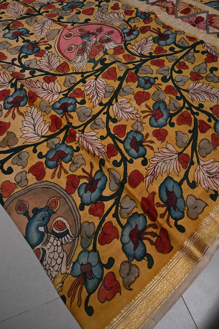 Floral and Peacock Theme : Authentic Pen Kalamkari Handpainted  on Mysore Silk Saree with Zari Border | SILK MARK CERTIFIED | SHOBITAM