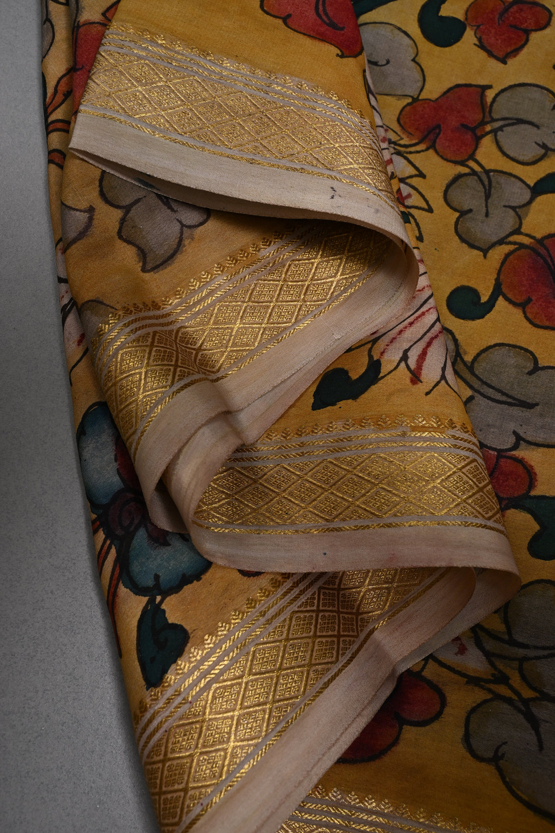 Floral and Peacock Theme : Authentic Pen Kalamkari Handpainted  on Mysore Silk Saree with Zari Border | SILK MARK CERTIFIED | SHOBITAM