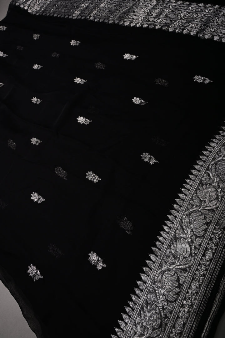 Black Pure Chiffon Silk Saree with Silver Tone Floral Zari Buttas and Zari Border | SILK MARK CERTIFIED | SHOBITAM