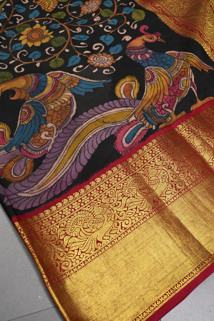 Floral and Peacock Theme : Black Authentic Pen Kalamkari Handpainted on Pure Kanjivaram Silk Saree with Contrast Zari Border | SILK MARK CERTIFIED | SHOBITAM