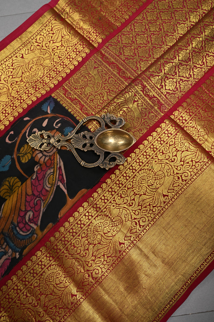 Floral and Peacock Theme : Black Authentic Pen Kalamkari Handpainted on Pure Kanjivaram Silk Saree with Contrast Zari Border | SILK MARK CERTIFIED | SHOBITAM