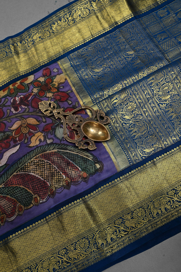 Peacock and Floral Theme : Purple Authentic Pen Kalamkari Handpainted on Pure Kanjivaram Silk Saree with Contrast Zari Border | SILK MARK CERTIFIED | SHOBITAM
