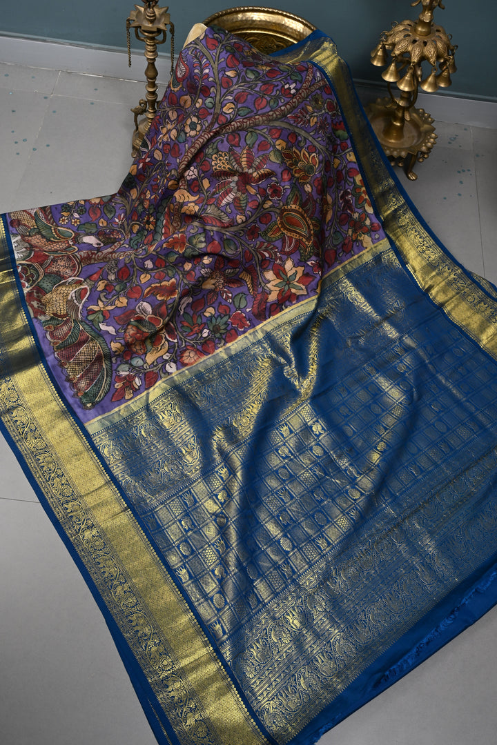 Peacock and Floral Theme : Purple Authentic Pen Kalamkari Handpainted on Pure Kanjivaram Silk Saree with Contrast Zari Border | SILK MARK CERTIFIED | SHOBITAM