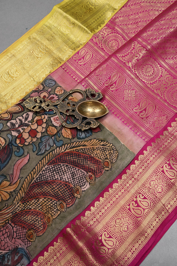 Floral-Peacock Theme : Authentic Pen Kalamkari Handpainted on Pure Kanjivaram Silk Saree with Ganga Jamuna Zari Border | SILK MARK CERTIFIED | SHOBITAM