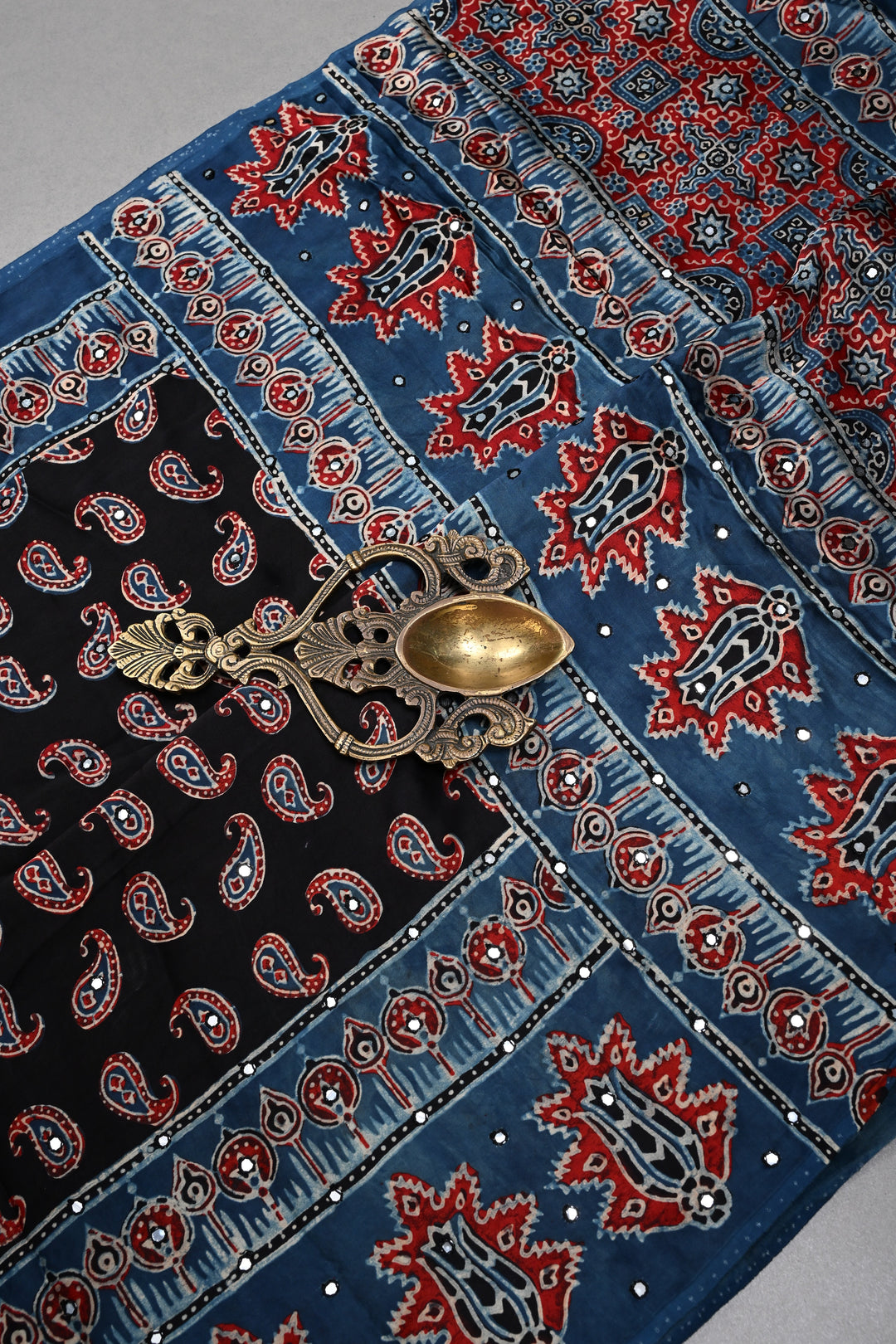 Black Authentic Ajrakh Hand Block Print on Modal Silk Saree with Hand Embellished Tikki work and Border | SHOBITAM