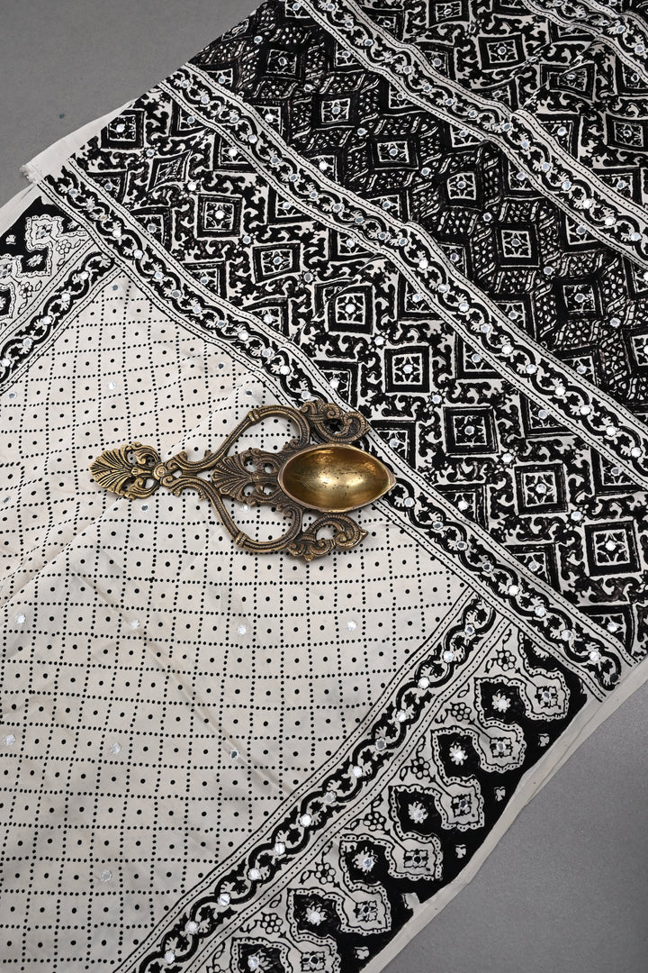 Tikki handwork on Ajrakh Modal Silk Saree in Ivory SHOBITAM