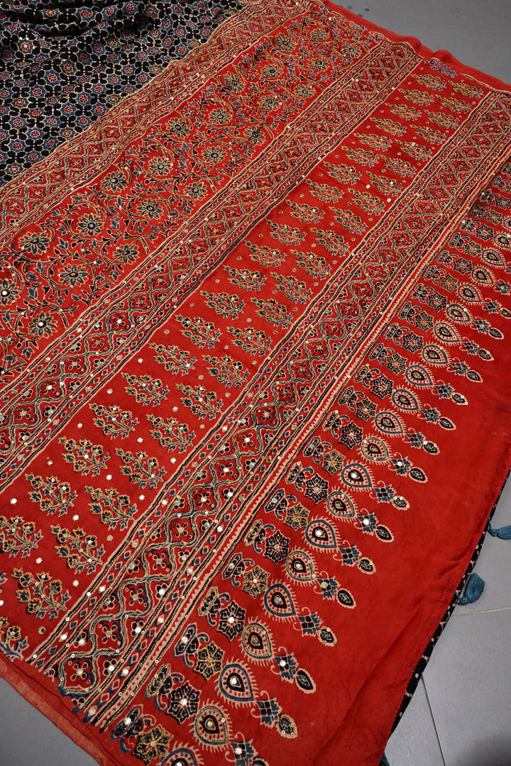 Handwork Ajrakh Saree with Tikki and Aari work on Black Red Ajrakh on Modal Silk   | SHOBITAM