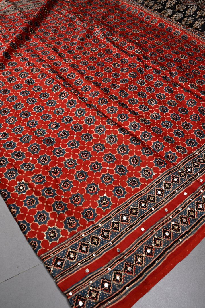 Handwork Ajrakh Saree with Tikki and Aari work on Red Black Ajrakh on Modal Silk  | SHOBITAM