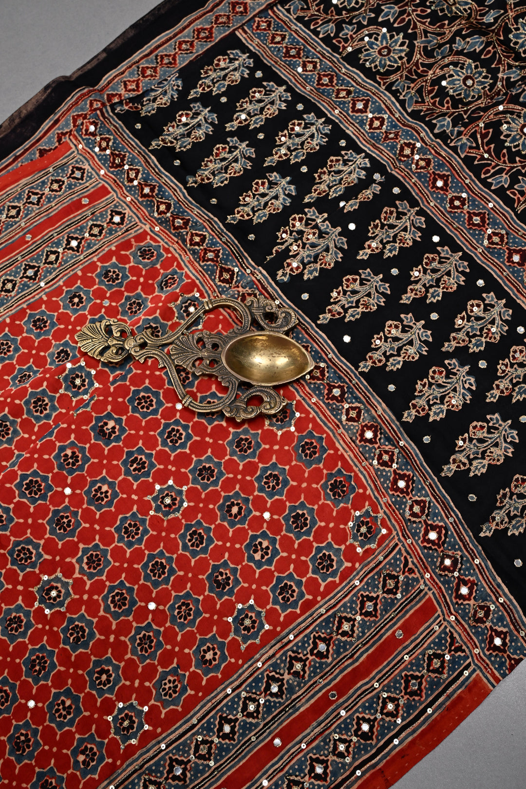 Handwork Ajrakh Saree with Tikki and Aari work on Red Black Ajrakh on Modal Silk  | SHOBITAM