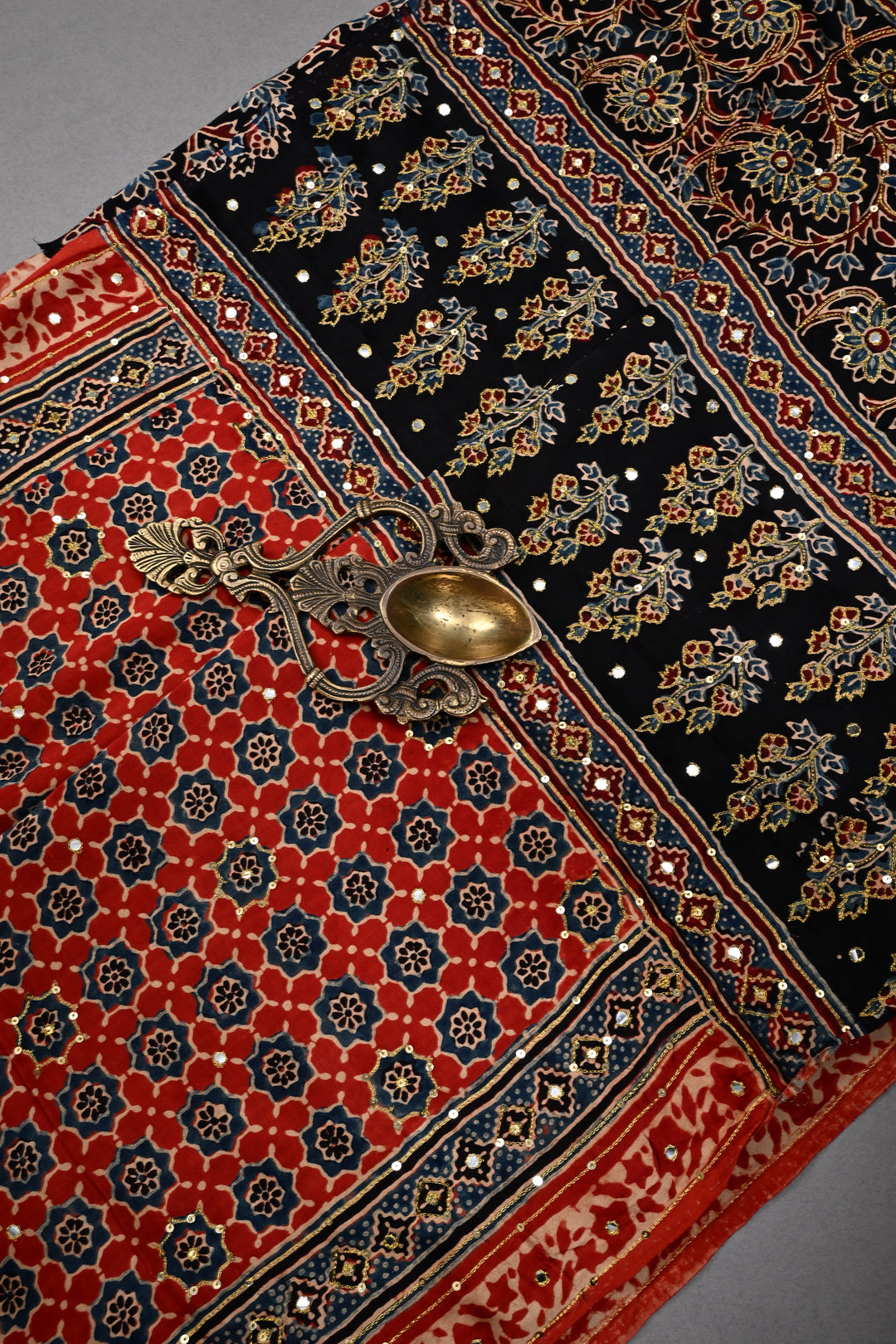 Handwork Ajrakh Saree with Tikki and Aari work on Striking Red Black Ajrakh on Modal Silk  | SHOBITAM