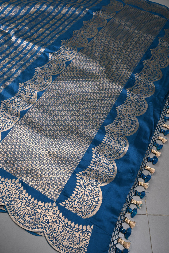 Peacock Blue Banarasi Katan Silk Saree with Floral Vertical Zari Stripes and Scallop Zari Border | SILK MARK CERTIFIED | SHOBITAM