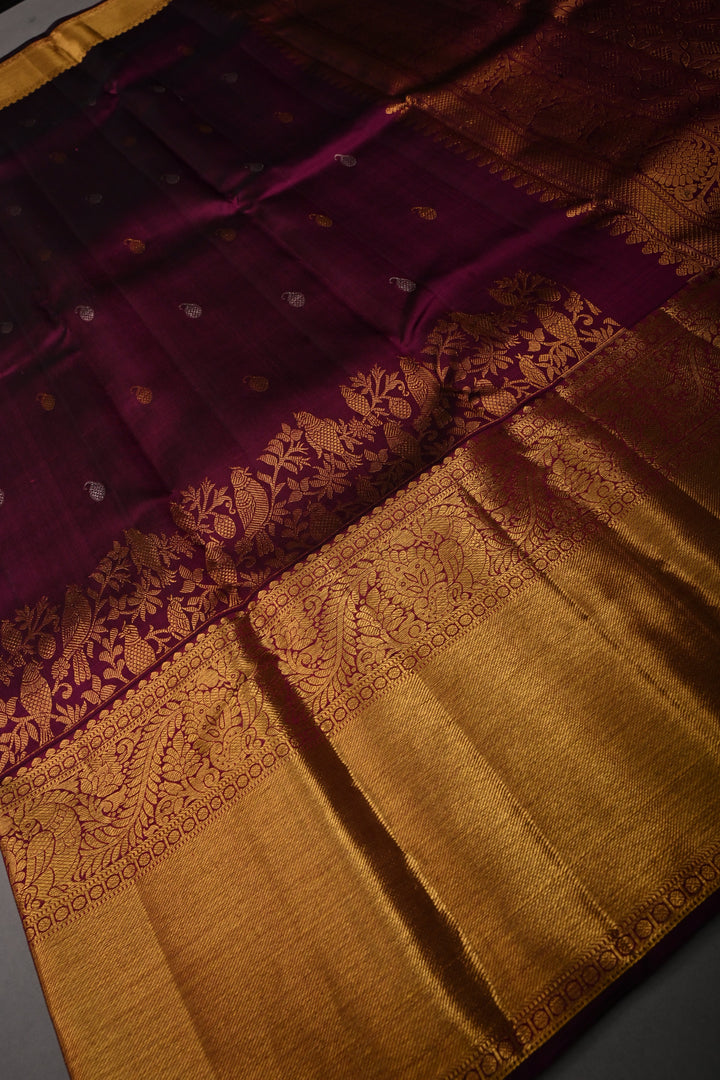 Plum Pure Kanjivaram Silk Saree with Gold-Silver Zari Buttas and Birds Panel Design on Wide Zari Border | SILK MARK CERTIFIED | SHOBITAM
