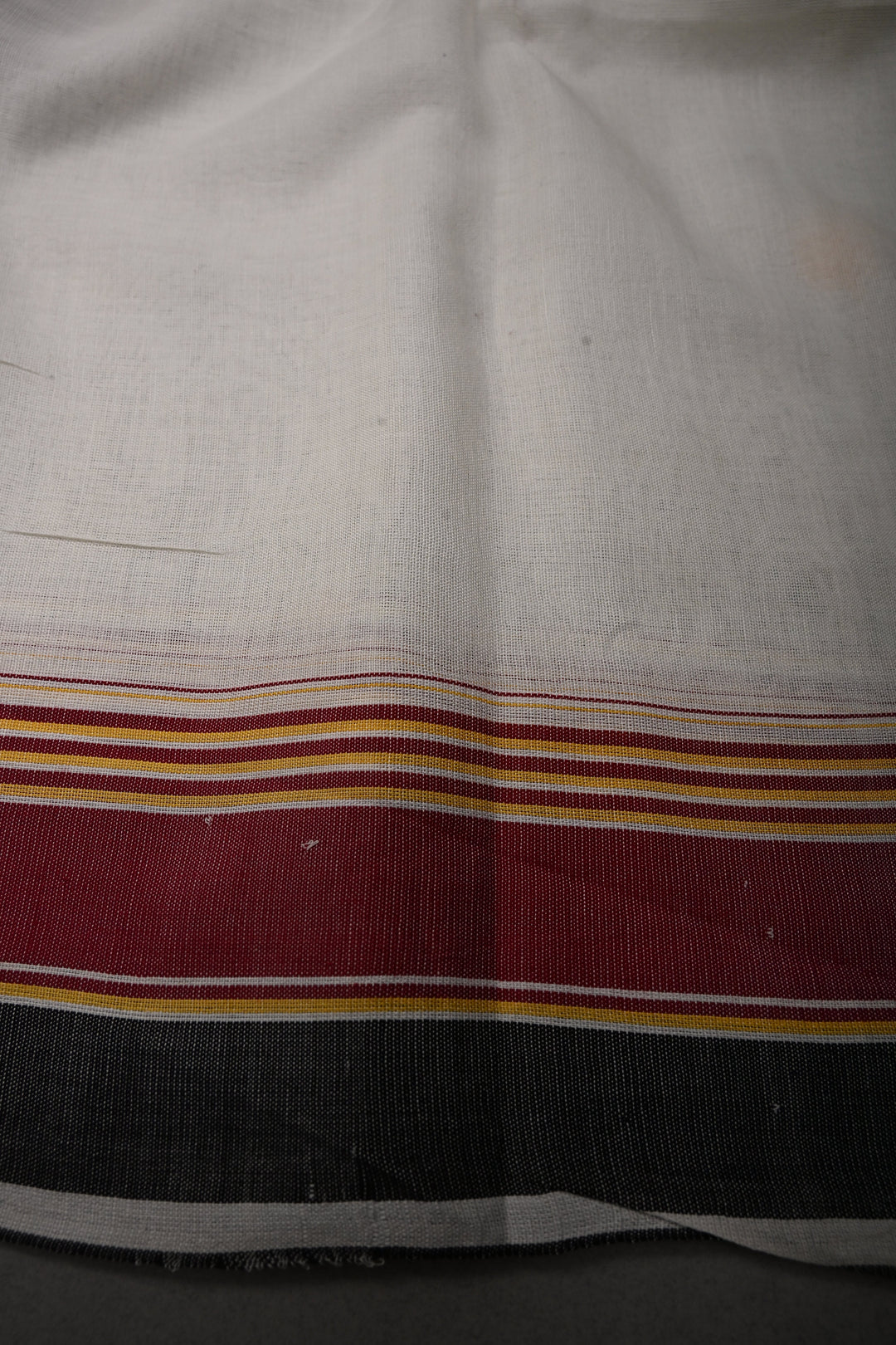 Ivory Bhujodi Kala Cotton Saree with Thread Buttas and Contrast Border | SHOBITAM