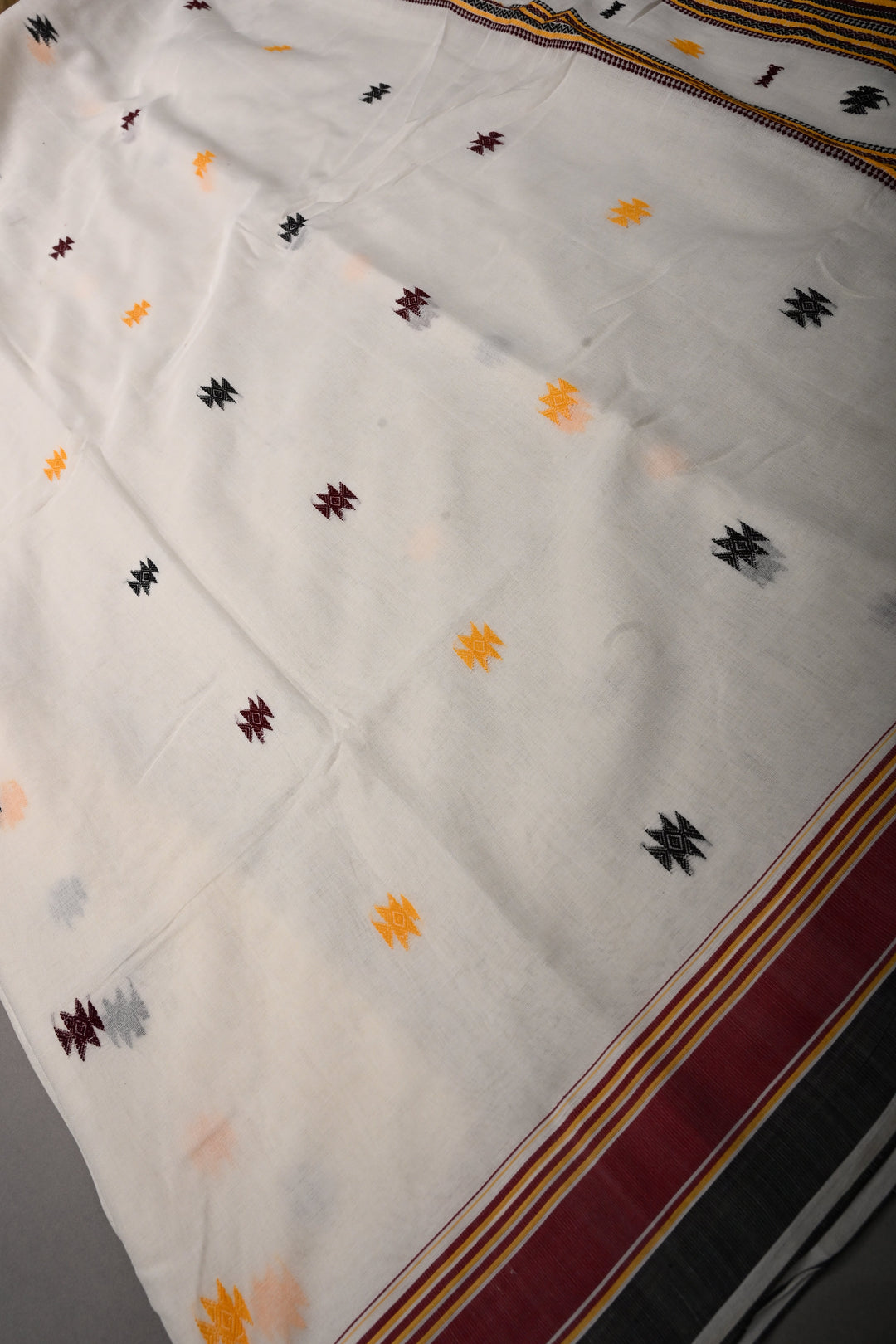 Ivory Bhujodi Kala Cotton Saree with Thread Buttas and Contrast Border | SHOBITAM
