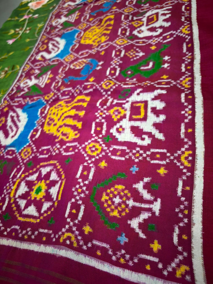 Authentic Double Ikkat Patan Patola Handwoven Saree in Deep Mehendi Green  with Parsi Gara Full Jaal Hand Embroidery and Reddish Pink Border | SILK MARK CERTIFIED | SHOBITAM